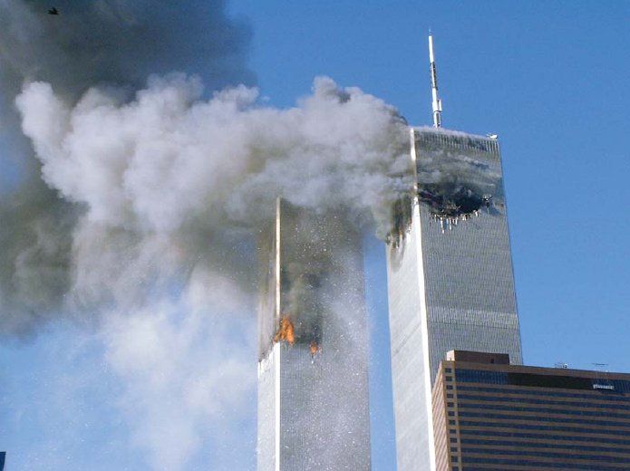 twin_towers_in_fire_-_911-_fema_picture.